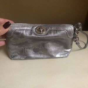 Couch silver wristlet.